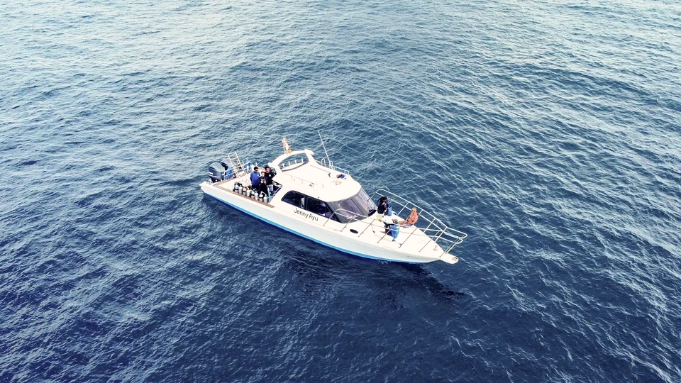 Our speedboat Jenny Ayu with dive equipment and guests off Bali