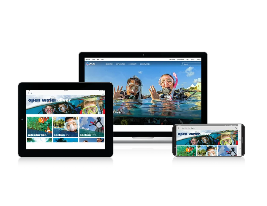 Digital PADI Open Water Diver learning materials on computer, tablet and smartphone
